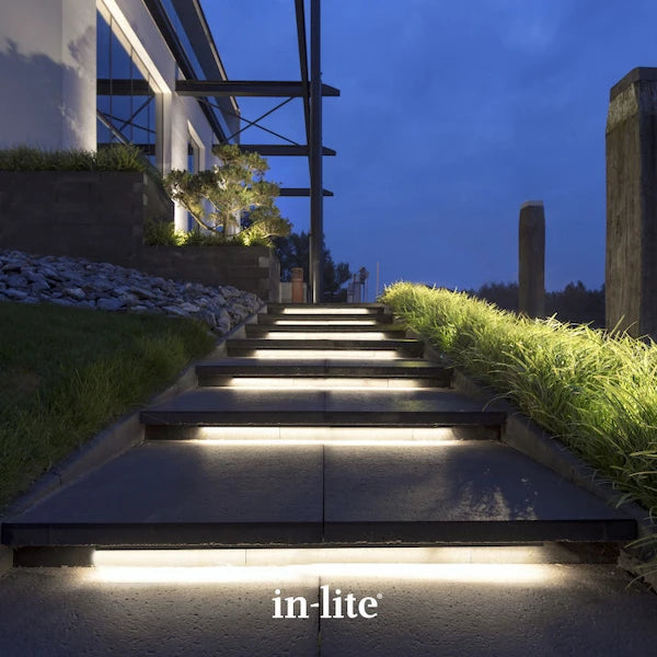 in-lite atmospheric garden lighting - EVO HYDE 550 Dark 12v outdoor surface lights illuminating walkway steps and risers.