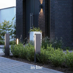 in-lite atmospheric garden lighting - EVO 12v outdoor bollard lights positioned along driveway border illuminating driveway paving.