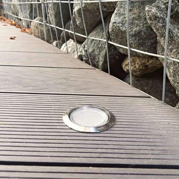 in-lite HYVE 12v LED low voltage outdoor recessed light installed in deck board.