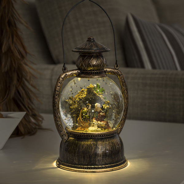 Konstsmide water filled lantern with nativity scene decorating table